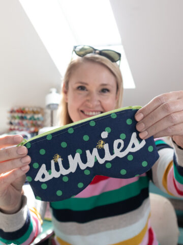 woman holding handmade sunglasses case
