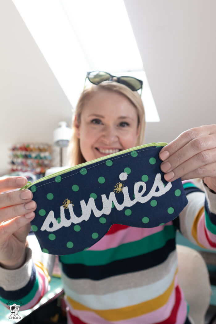 woman holding handmade sunglasses case
