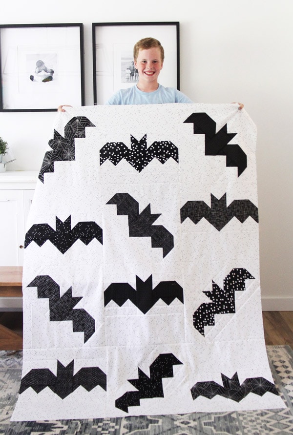 person holding a bat halloween quilt