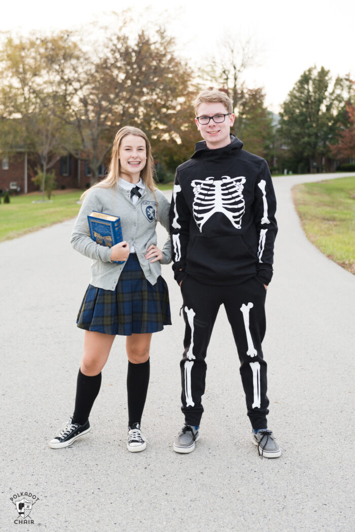 Teen girl in Gilmore Girls costume and teen boy in DIY Skeleton Halloween costume, standing outdoors