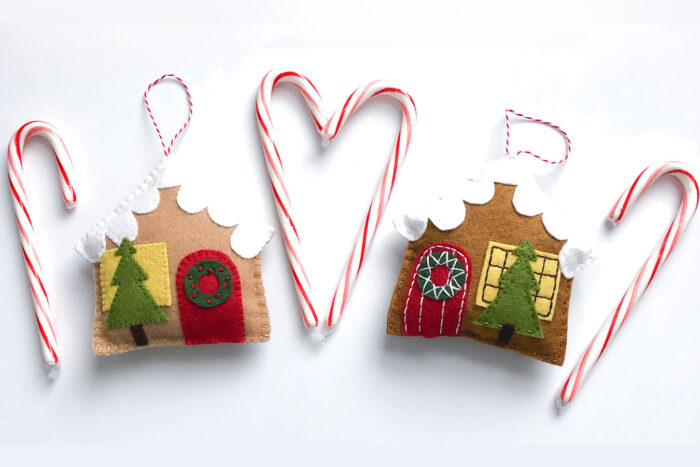 Felt Gingerbread house ornaments on white tabletop
