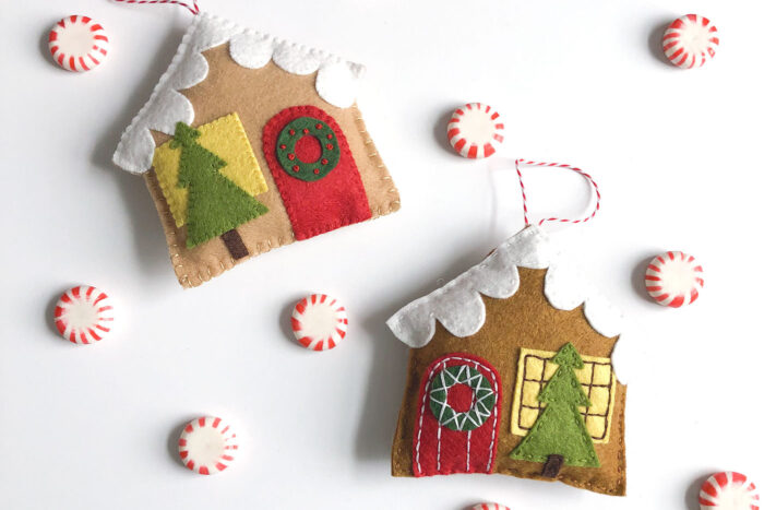 Felt Gingerbread house ornaments on white tabletop