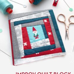 Improv quilt block needle case on white table