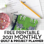 printed out planner pages on white grid cutting mat