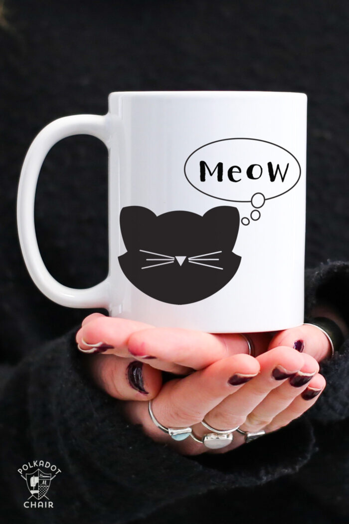 meow mug white mug with black text