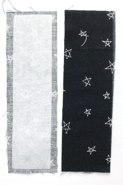 black fabric cut and ready to be sewn into bookmark