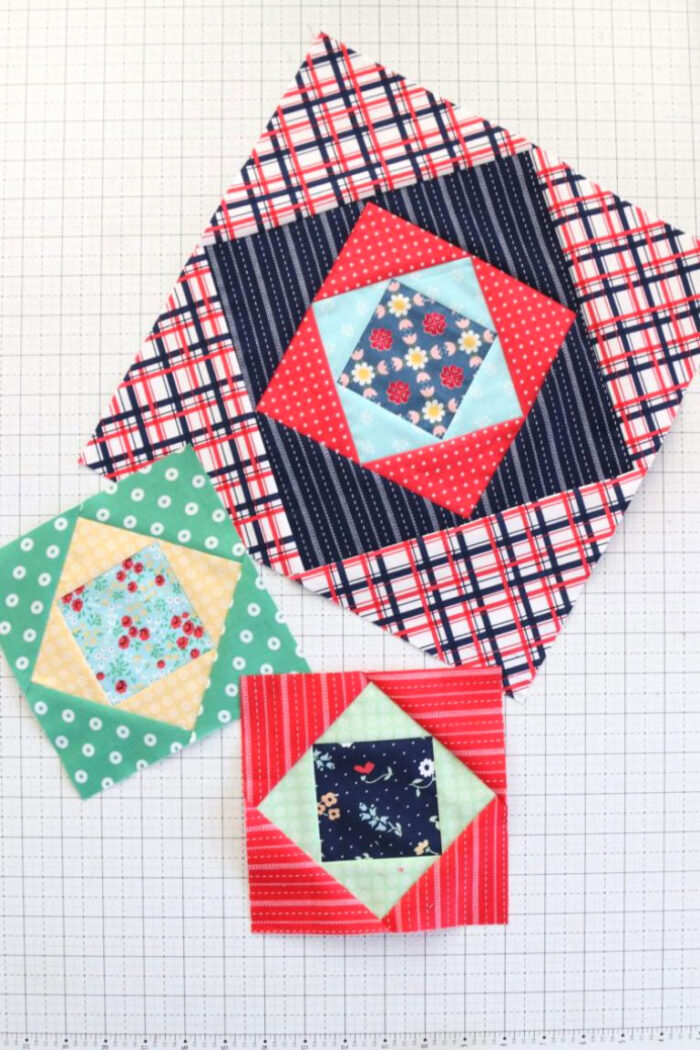 finished quilt blocks on white cutting mat