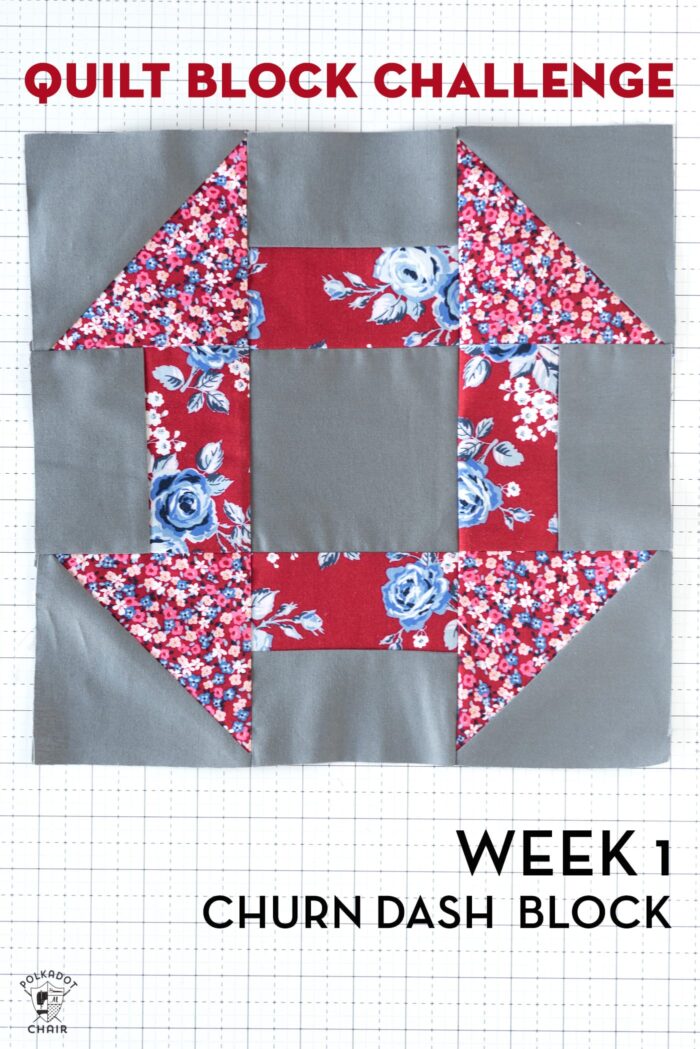 gray and red churn dash quilt block on white cutting mat