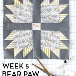 quilt blocks in various colors on white cutting mat