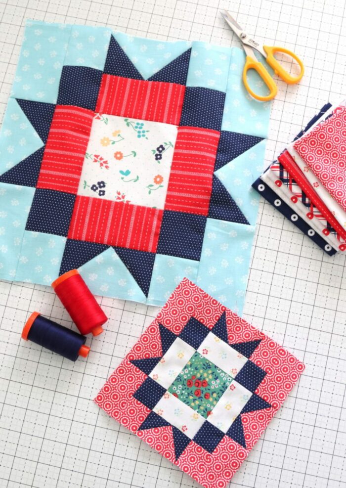 red white and blue quilt blocks in two sizes on white cutting mat