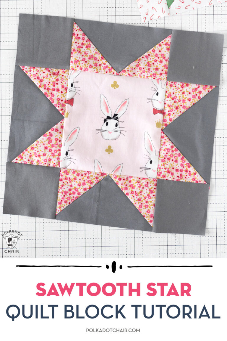 pink and gray sawtooth star quilt block on white cutting mat
