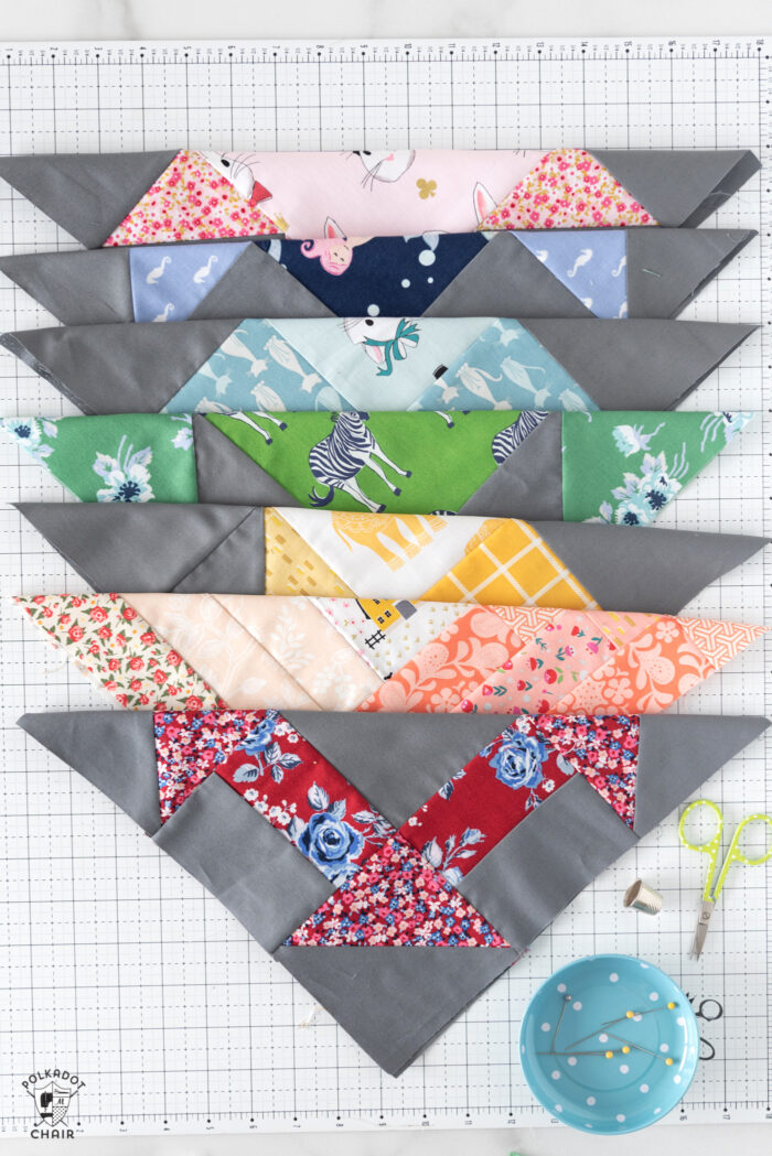 sewn quilt blocks on white cutting mat