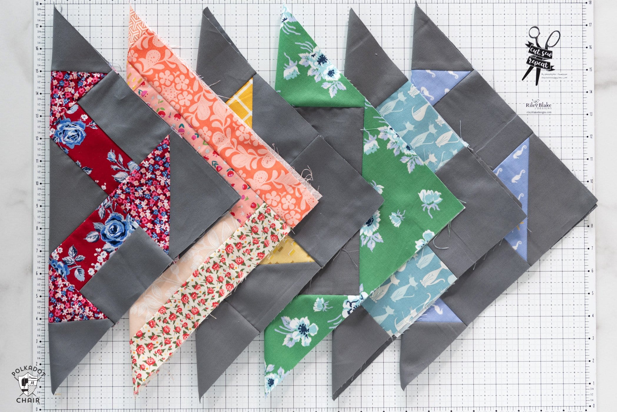 colorful quilt blocks on white cutting mat