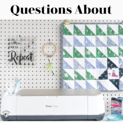photo of cricut maker with mini quilt on peg board