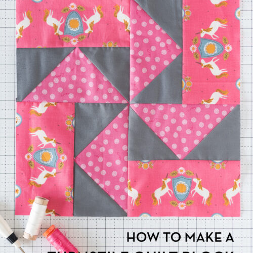 Pink and gray quilt block on white cutting mat