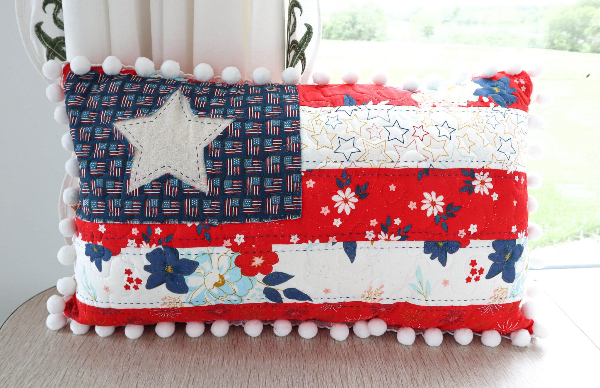 fabric pillow with red and white stripes
