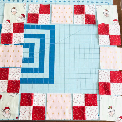 patchwork table topper pieces on cutting mat