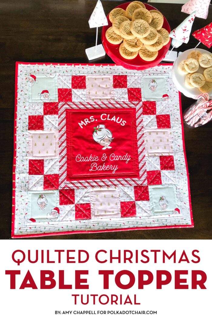 red white and pink christmas table topper with cookies on brown table