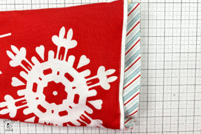 christmas stockings in progress on white cutting mat