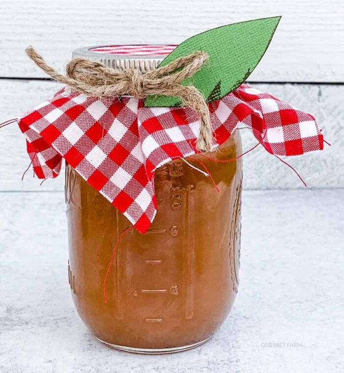 jar of caramel apple dip on white table