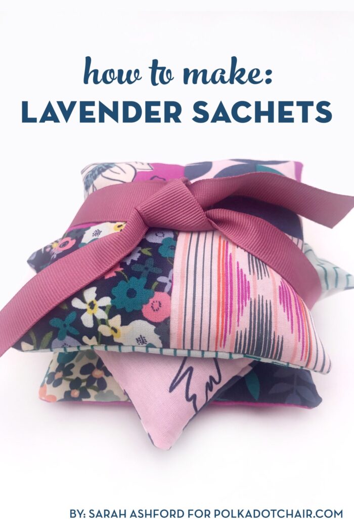 stack of lavender sachets tied up with ribbon on white table