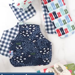blue baby burp cloths on white marble countertop