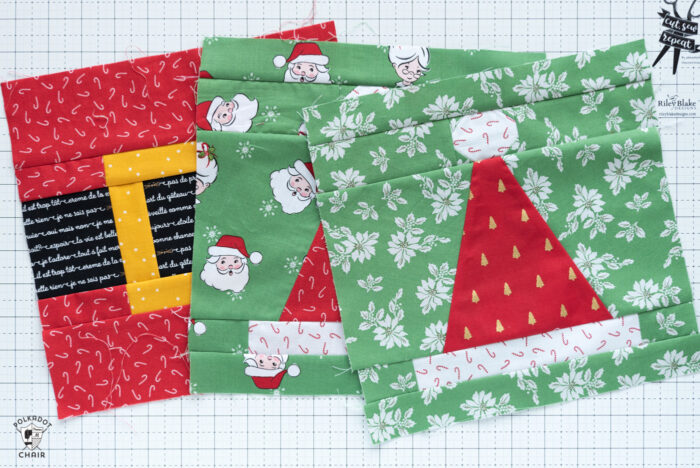 santa hat quilt blocks on white cutting mat