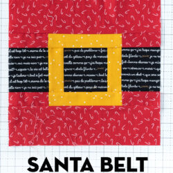 Photo of sewn santa belt quilt block on white cutting mat