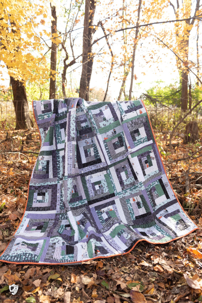 quilt on fence outdoors