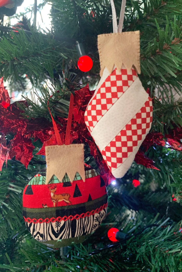 Finished scrappy Christmas ornament in red and white on Christmas Tree