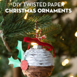 Twisted paper ornament hanging on Christmas tree