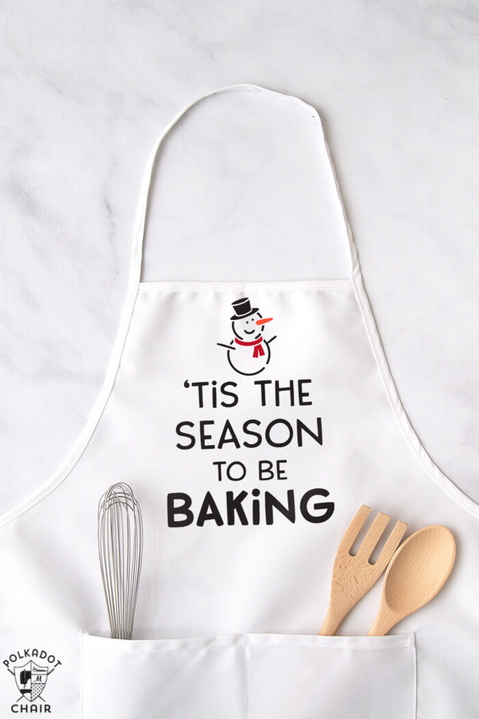 white apron with lettering