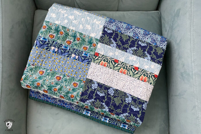 photo of a blue, green quilt on blue chair