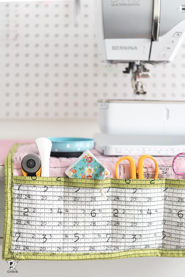 close up of sewing machine mat with tools