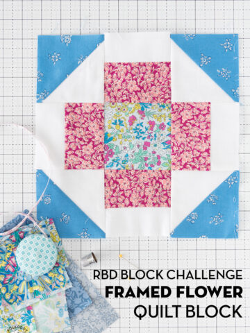 blue pink and floral quilt block on white cutting mat