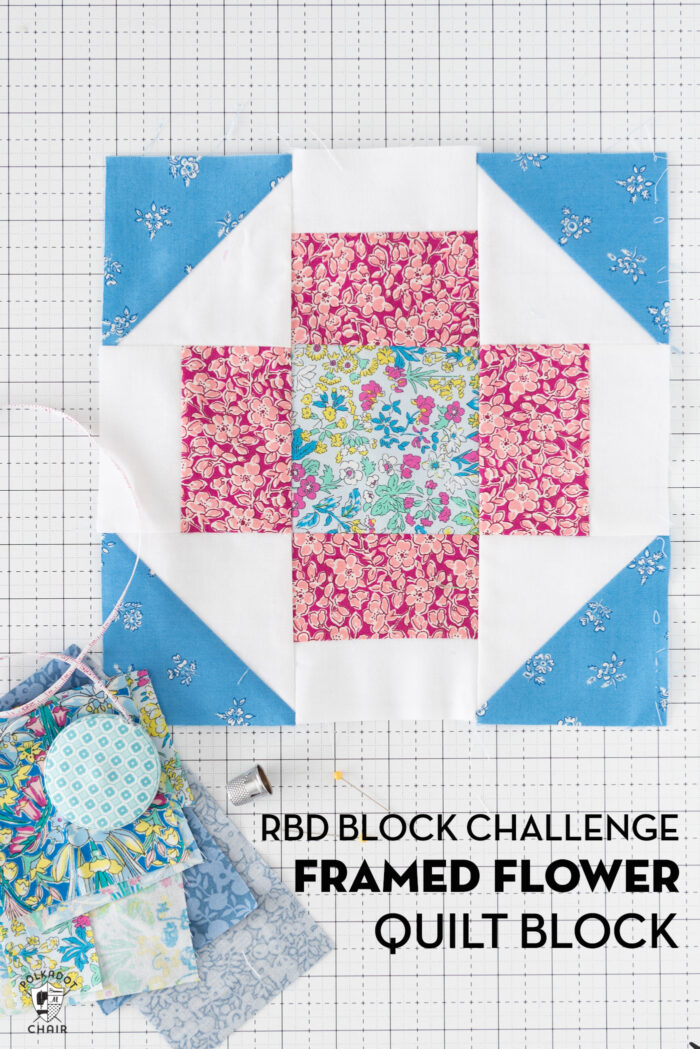 blue pink and floral quilt block on white cutting mat