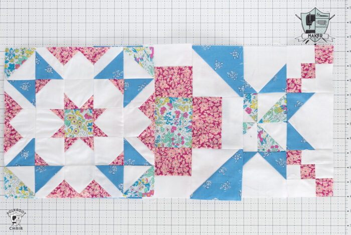 blue pink and floral quilt blocks on white cutting mat
