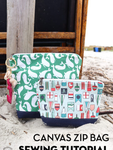 two nautical zip bags on beach