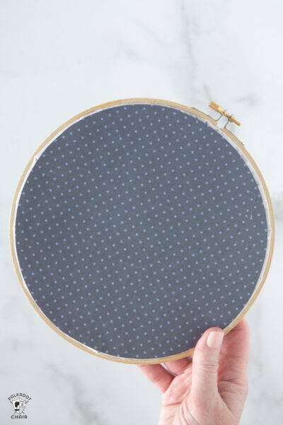 blue paper on back of embroidery hoop