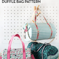3 duffle bags on pegs in front of white wall