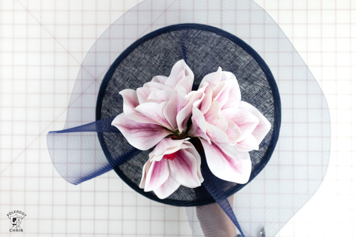 navy fascinator with pink flowers glued on