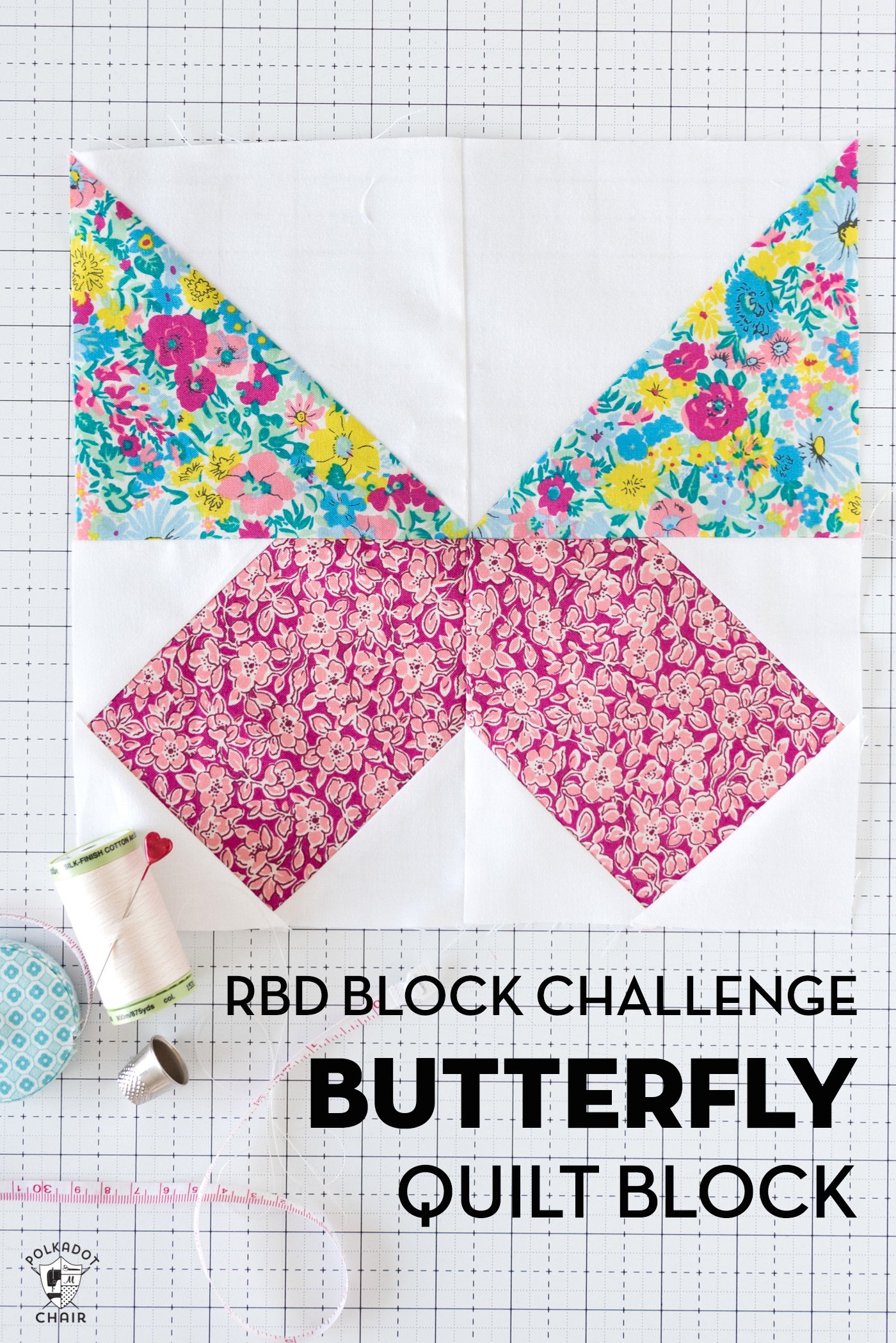 pink and bright floral butterfly quilt block on white cutting mat