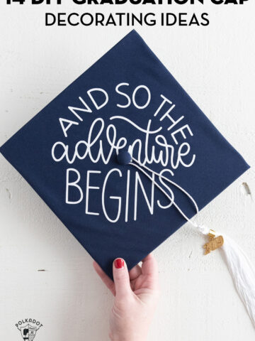 navy blue graduation cap with white lettering