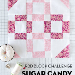 pink quilt block on white cutting mat