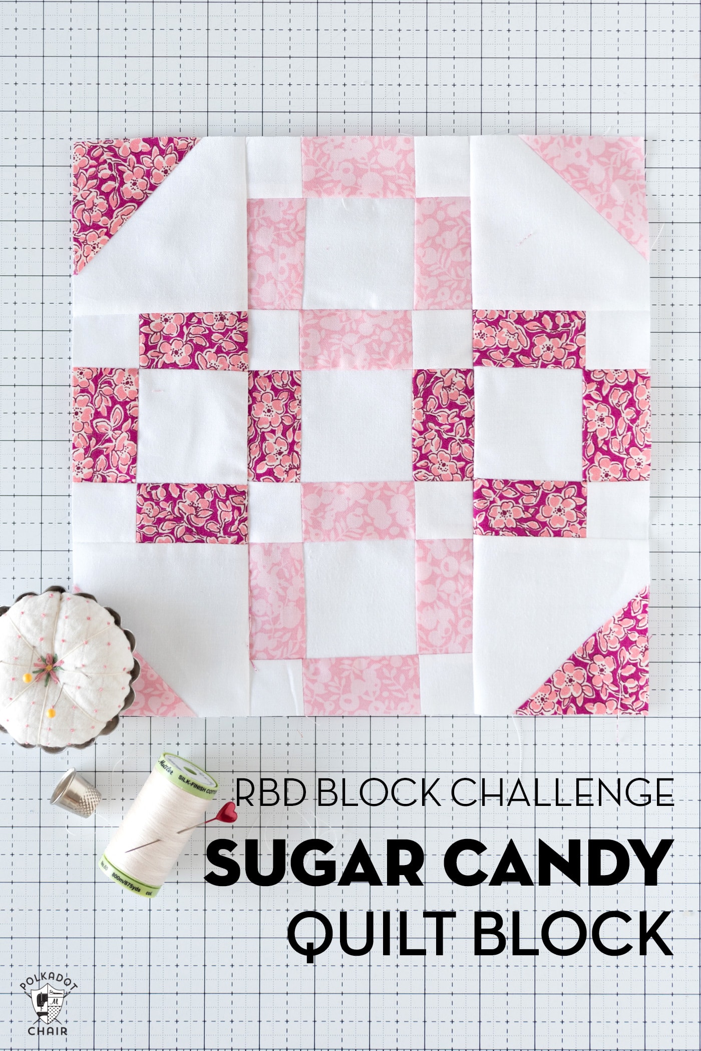 pink quilt block on white cutting mat