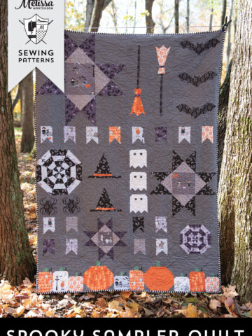 halloween quilt hanging outdoors.