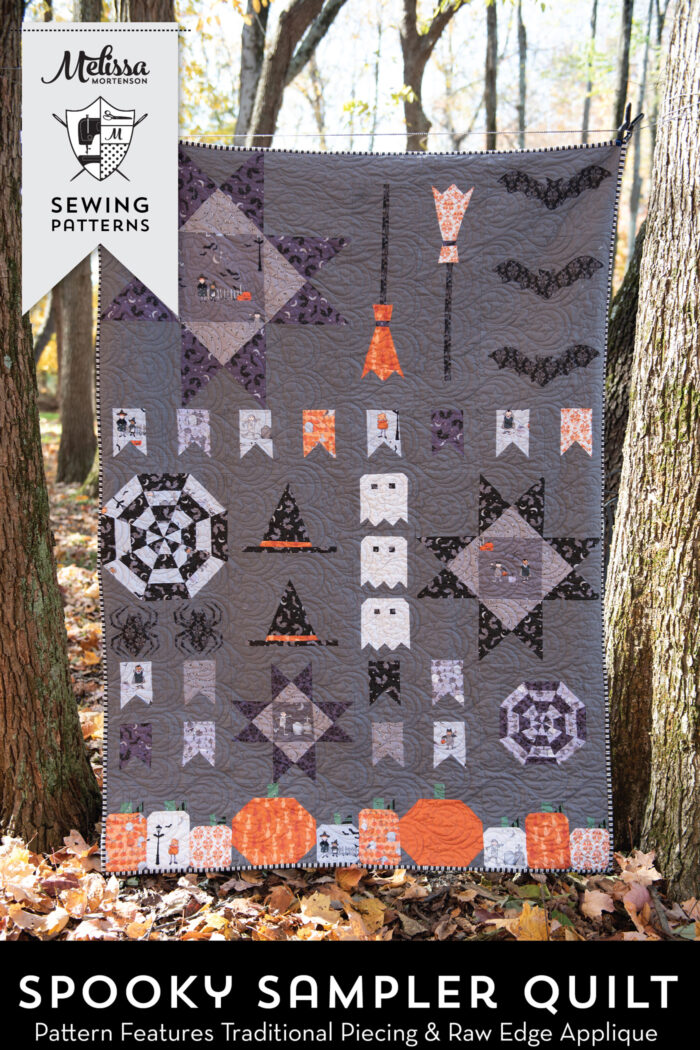 halloween quilt hanging outdoors.