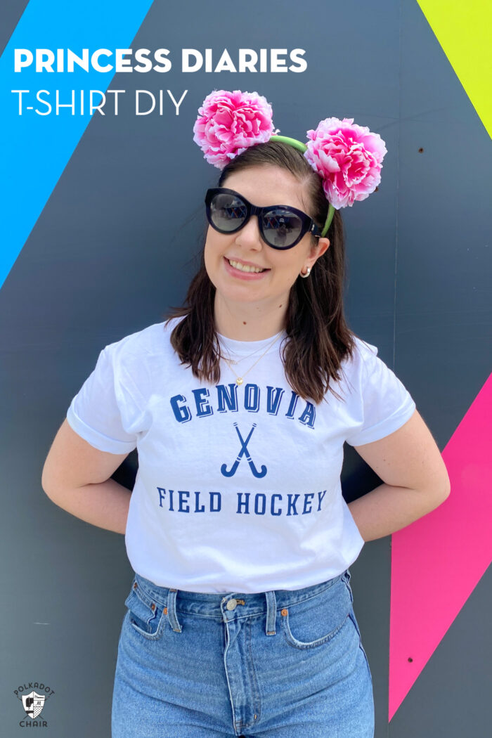 girl in white tee with genovia shirt in front of navy wall