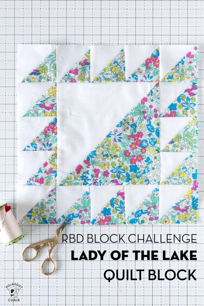 blue and white floral quilt block on white cutting mat