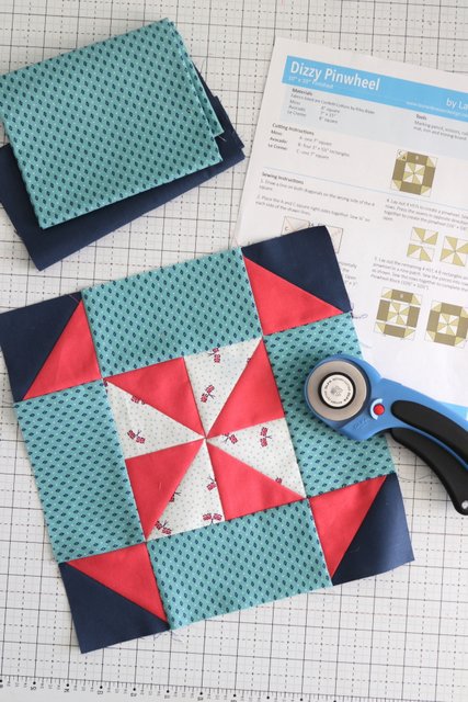 red, blue and turquoise quilt block with tools